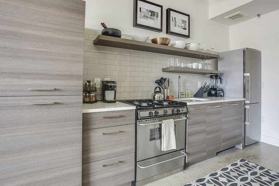 Kitchen with oven and fridge