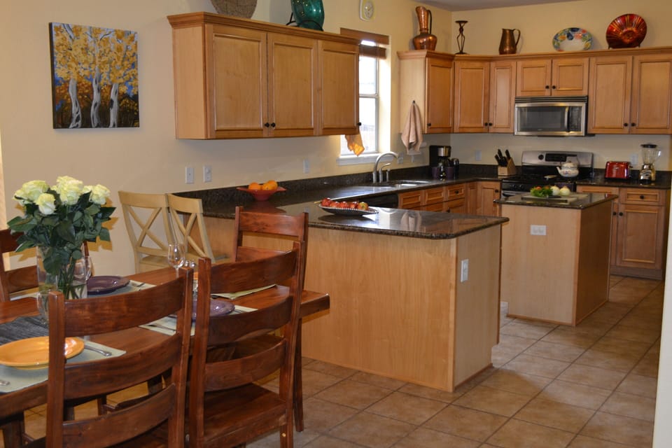 We have an inviting open kitchen/dining/living room floor plan, great for family