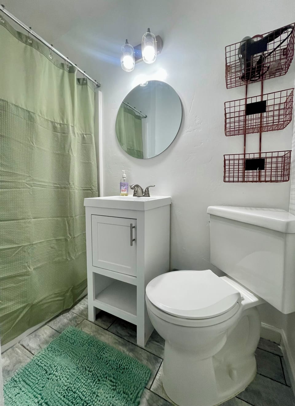 Bathroom with 36" walk in shower. We provide hair dryer and toilet paper