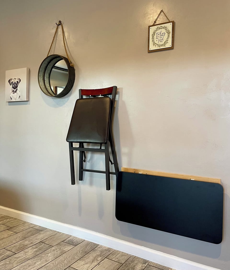 Remote workers can comfortably sit at this foldable work desk in the a/c 