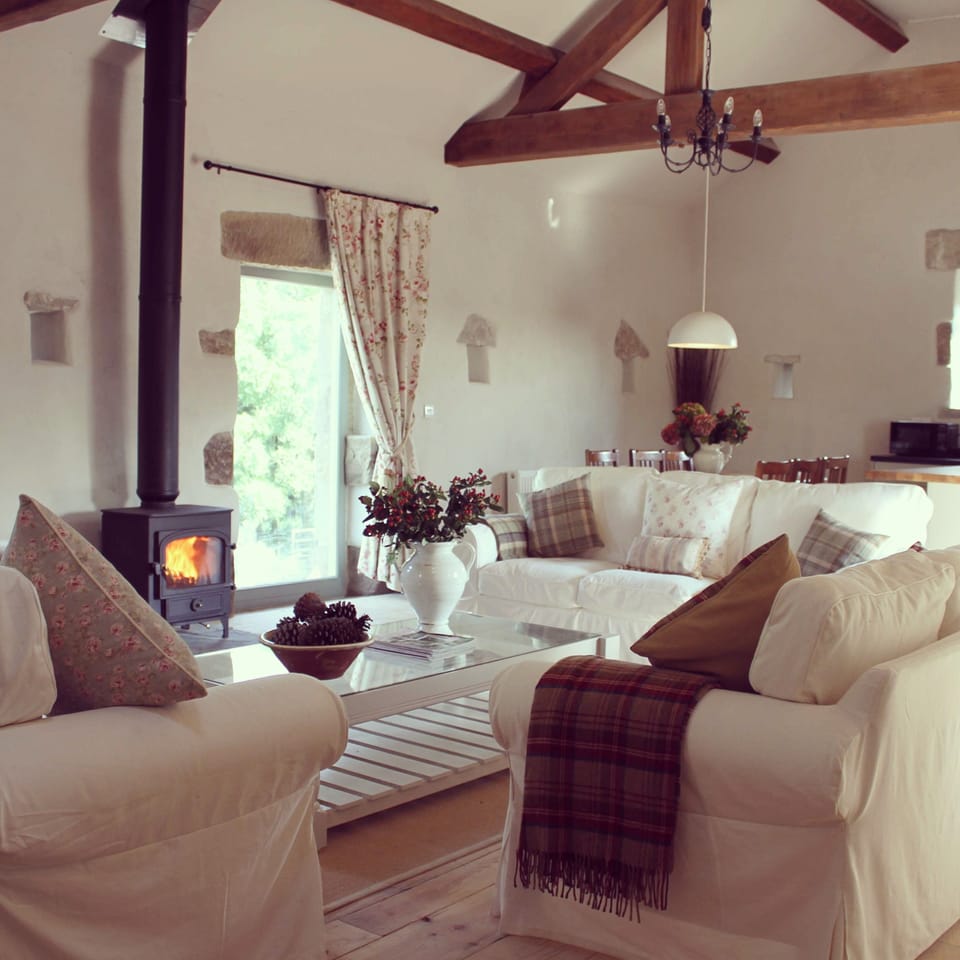 Large open plan lounge/dining /kitchen area with vaulted ceiling