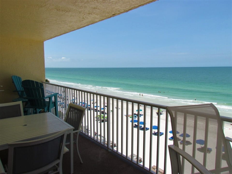 Plenty Of Comfortable Seats On The Private Beachfront Balcony - Balcony Overlooking Redington Shores Beach. Plenty of White Sandy Beaches and Beautiful Clearwater. The Sunsets are Incredible Here!