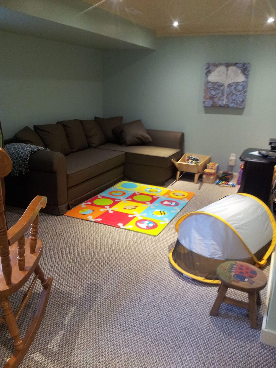 Living room sofa opens out to a double bed for extra guest