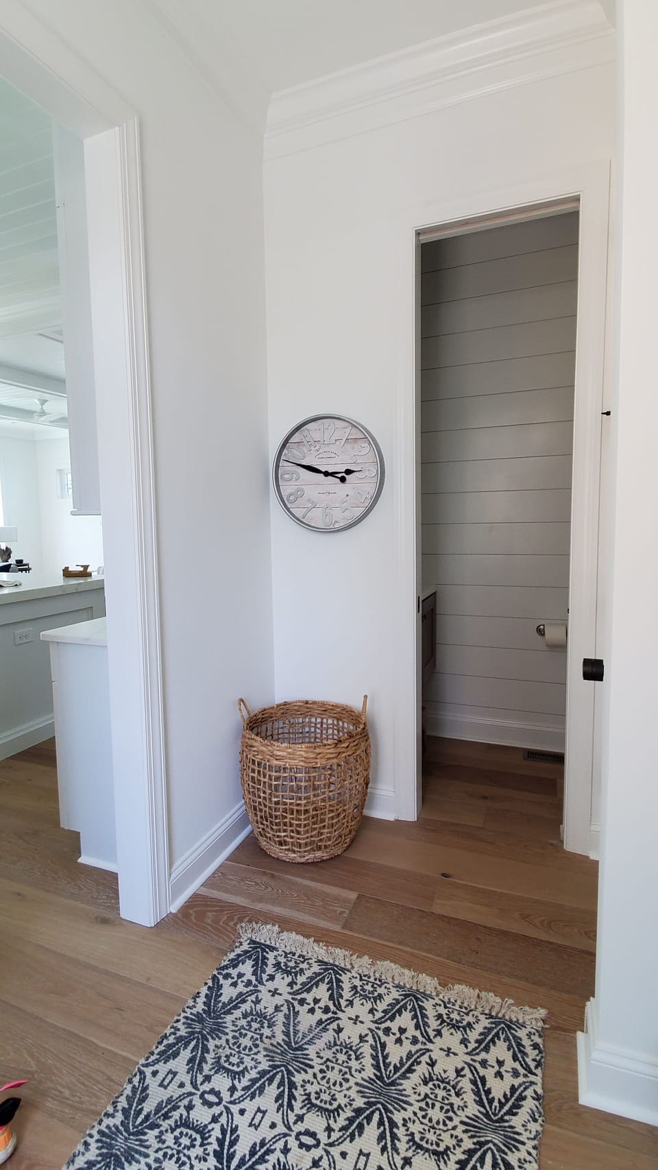 Mudroom entry with powder room. 