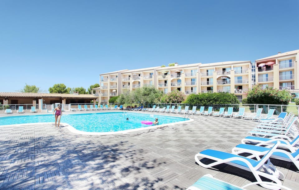 Spend time with family and friends in the outdoor pool during the summer.