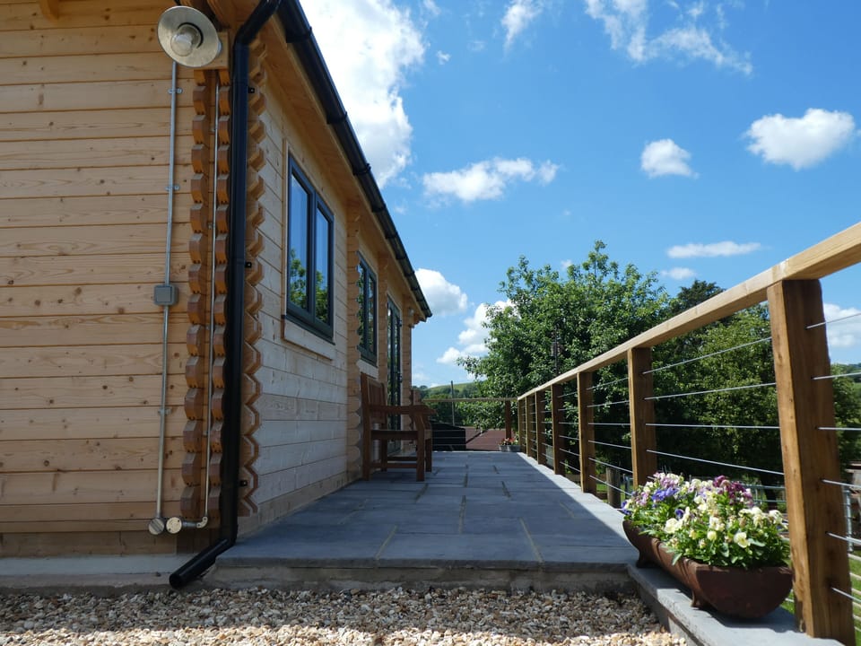 Patio area- looking out onto green fields and stream. 