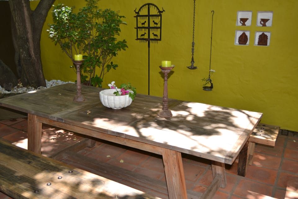 outside wooden table and benches 