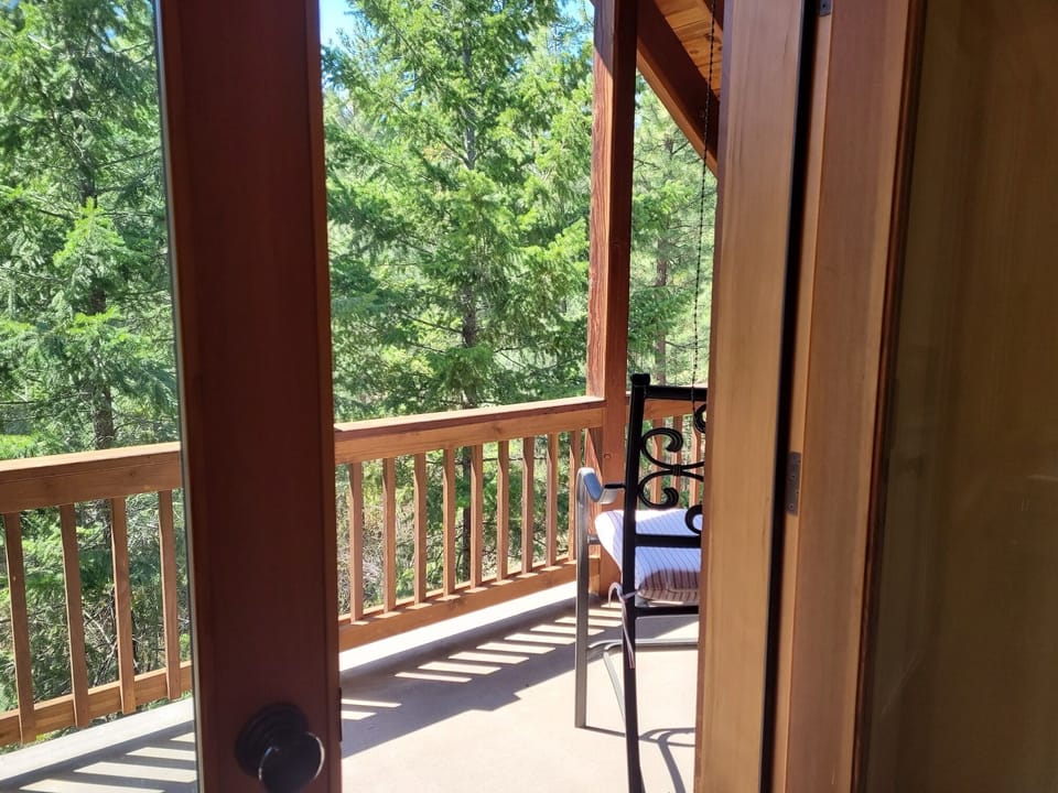 The balcony overlooks the wildlife preserve and Lucky Jim Mountain.