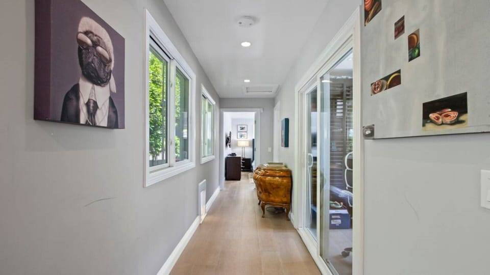 alway leading to the 3rd bedroom and bathroom, passing by the office