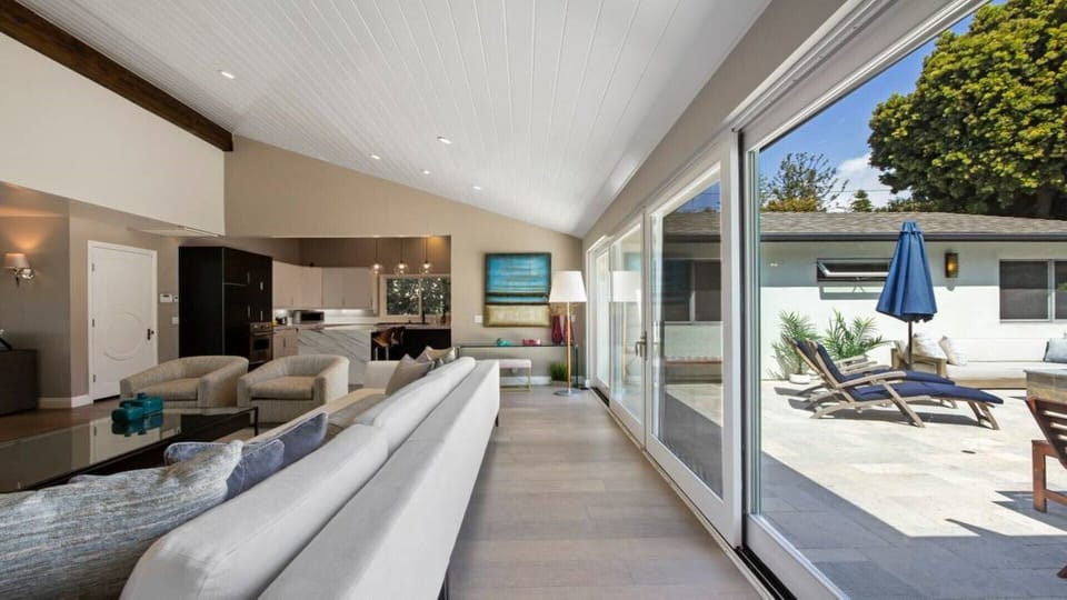 living room leading to back yard and pool