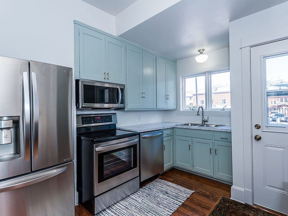 Kitchen with new appliances make make it great for cooking meals and home!