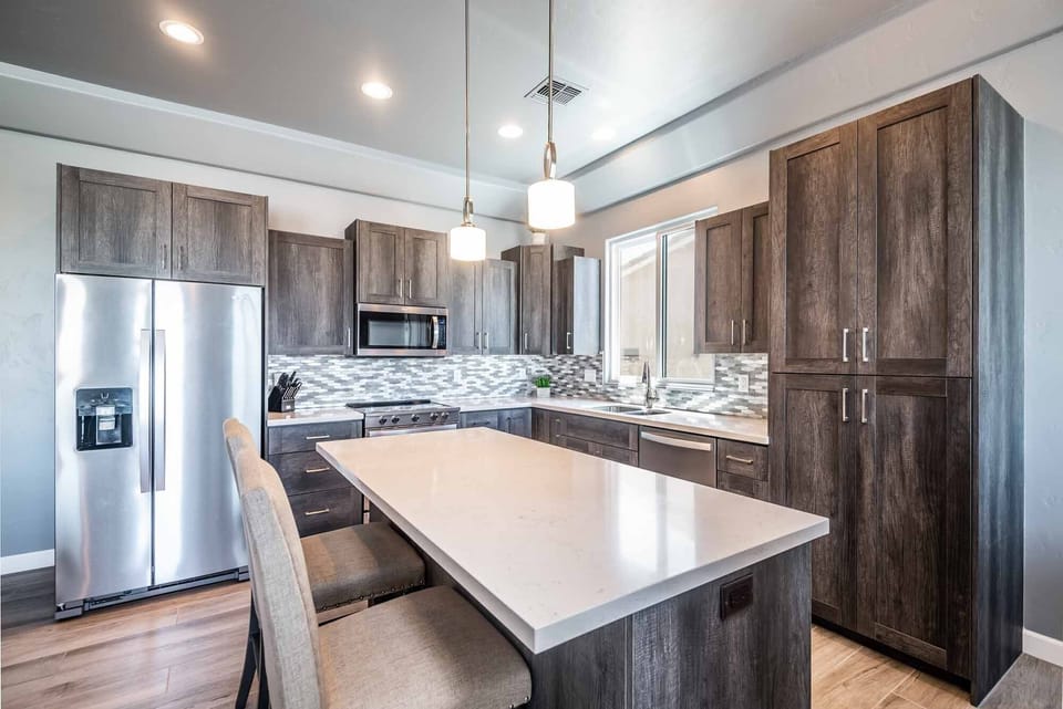 Kitchen with quartz countertops and stainless steal appliances
