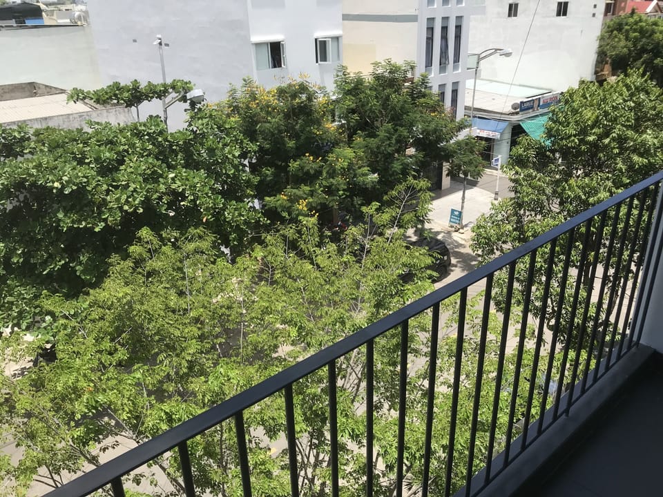 Street view from balcony. You can smoke here!