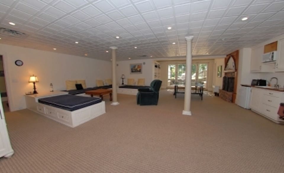 4 captain beds, fireplace, small kitchen, ping pong and pool table in basement. 