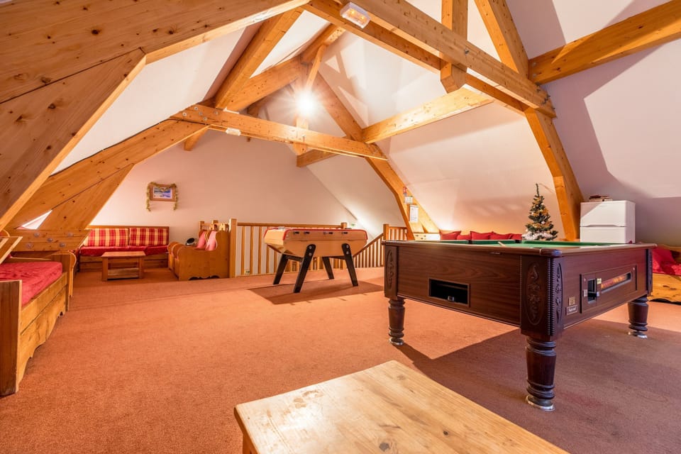 Shoot some pool with your group in the cozy billiards lounge.