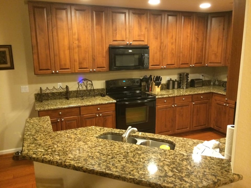 Kitchen - with new hardwood floors and granite counter tops