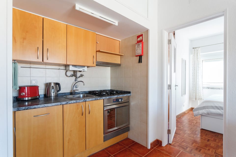 Kitchinette w/ dishwasher, electric oven and gas stove