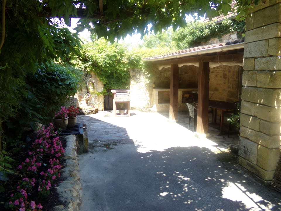 Private courtyard with covered eating area