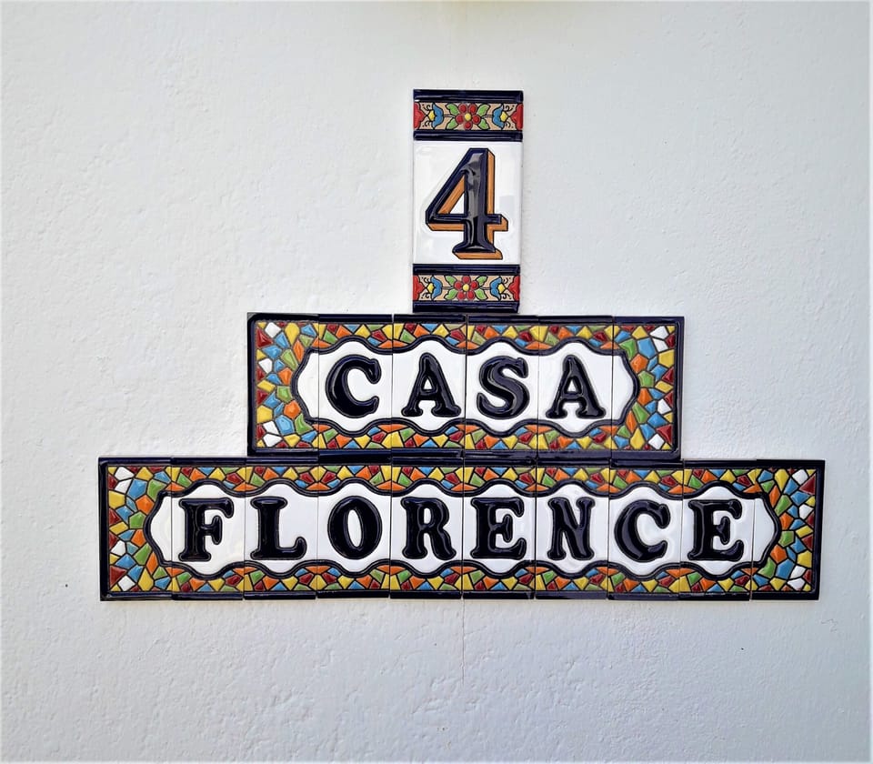 Sign on the front of the property