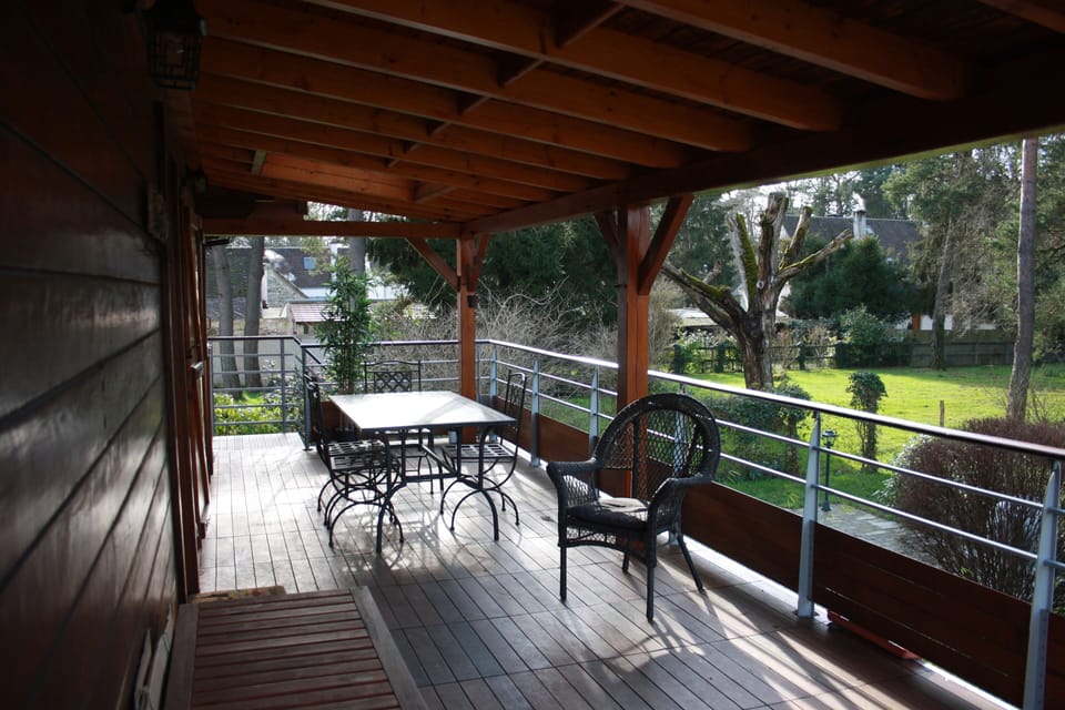 Large pergola, view on gardens. For outdoors sheltered dinners