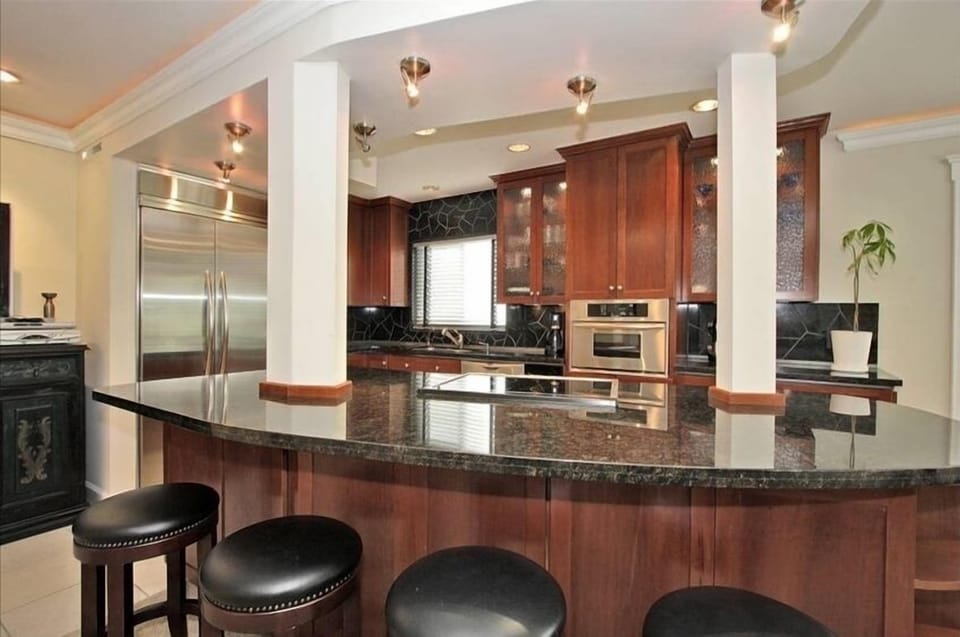 Gourmet Kitchen with Top of the Line Stainless Appliances.