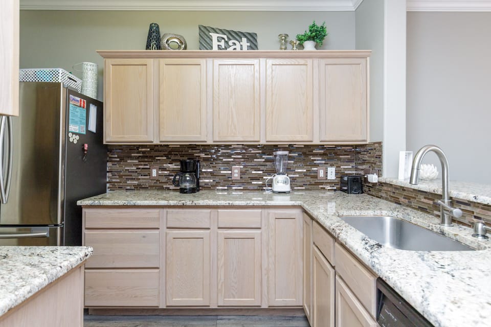 Your fully equipped kitchen features granite countertops, modern appliances, and everything you need to prepare meals during your stay.