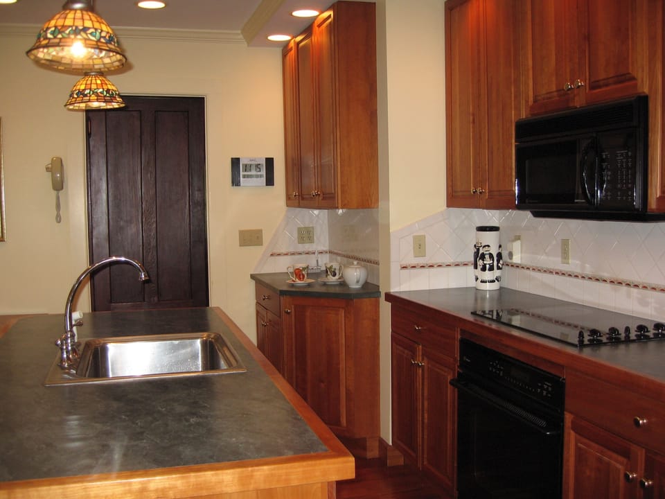 Kitchen; door to dining room in the rear