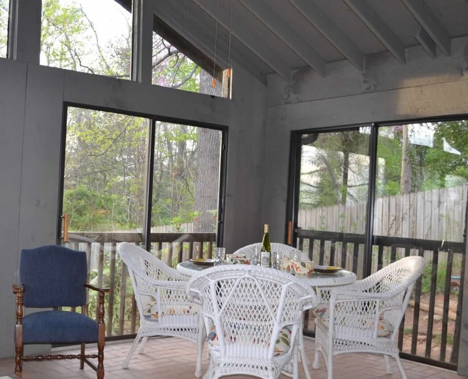 Relax in the private setting of the 3-Season Room with Cathedral Ceiling...