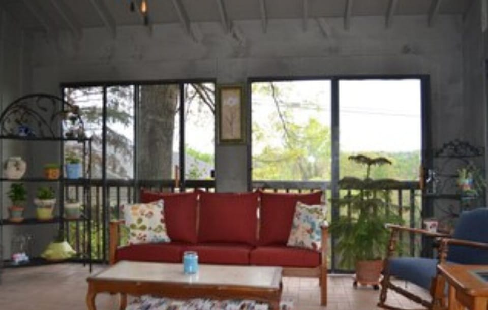Relax in the private setting of the 3-Season Room with Cathedral Ceiling...