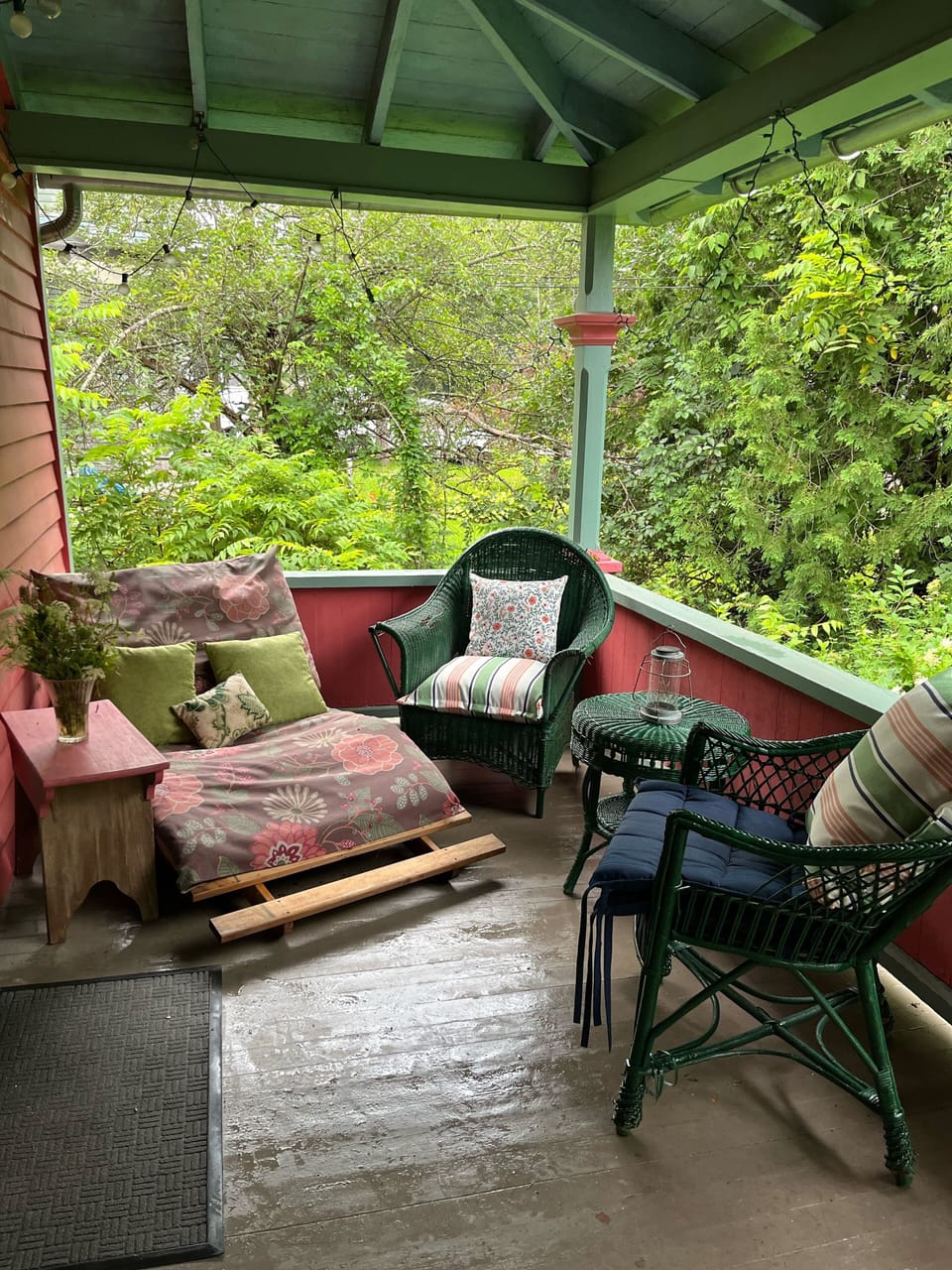 Futon & wicker chairs are good for naps or reading a book on a rainy afternoon. 