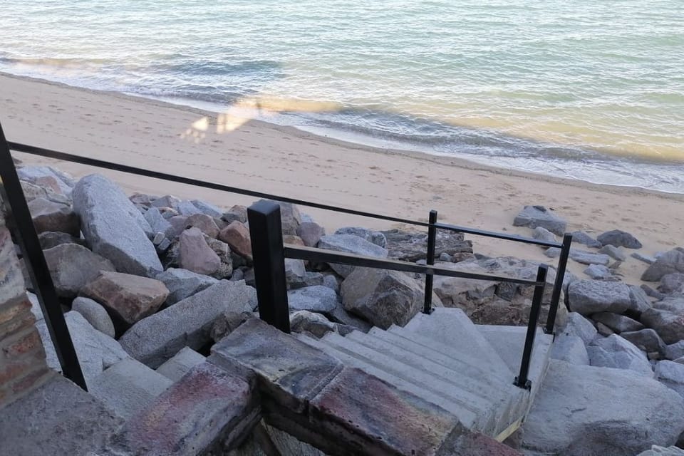 Walk down private stairs from Casa Habana in San Felipe Baja California Mexico straight to the sand — easy ocean access.