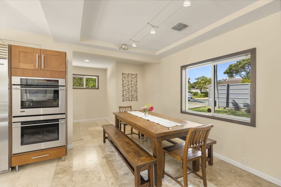 Breakfast Table. Perfect for family meals with a mix of bench and chair seating.