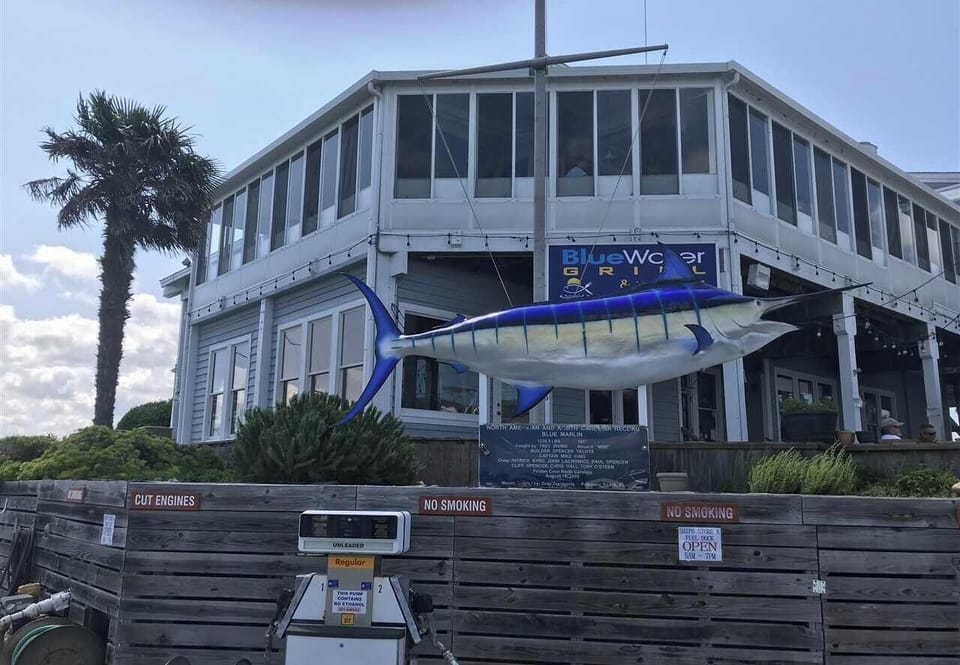 Blue Water Grill.  Serves lunch and dinner and is located in the marina.