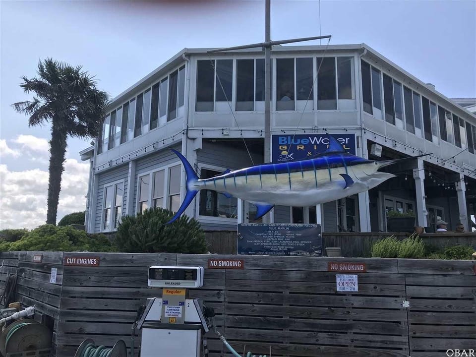 Blue Water Grill.  Serves lunch and dinner and is located in the marina.