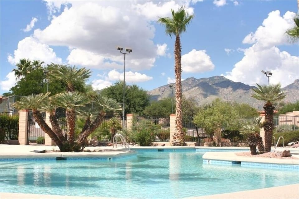 Community pool, spa, and tennis court directly accross the street