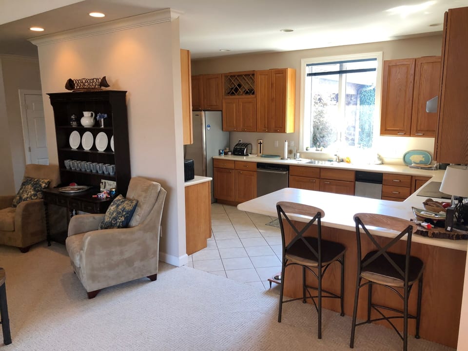 Well equipped kitchen with Thermador ceramic cooktop.