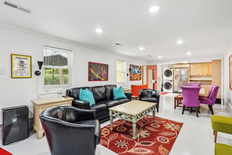 Comfortable and homey living room with music themed art throughout.