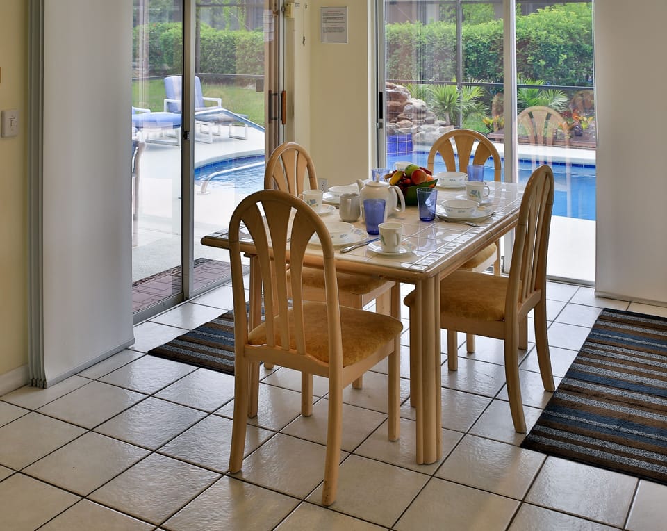 Breakfast Nook Overlooking Pool Area, Watefall and Lake