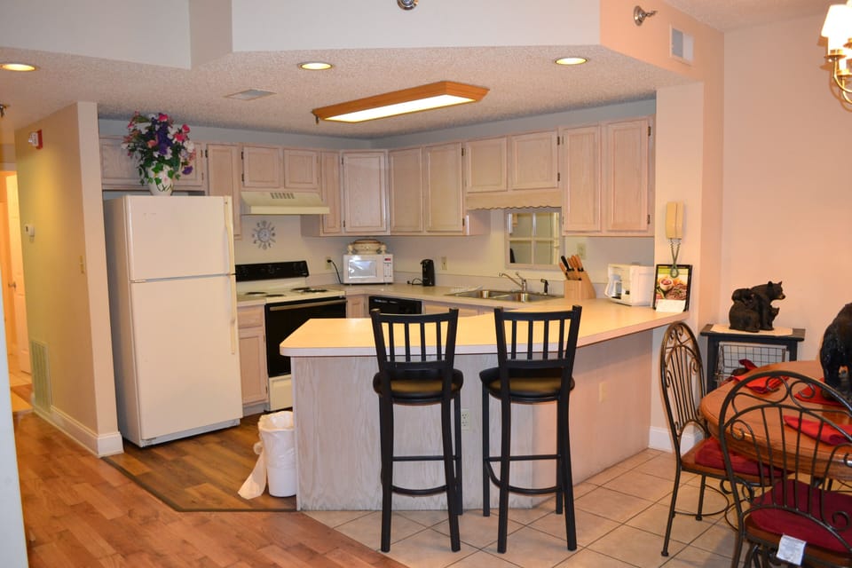 Room, Indoors, Flooring, Refrigerator, Chair