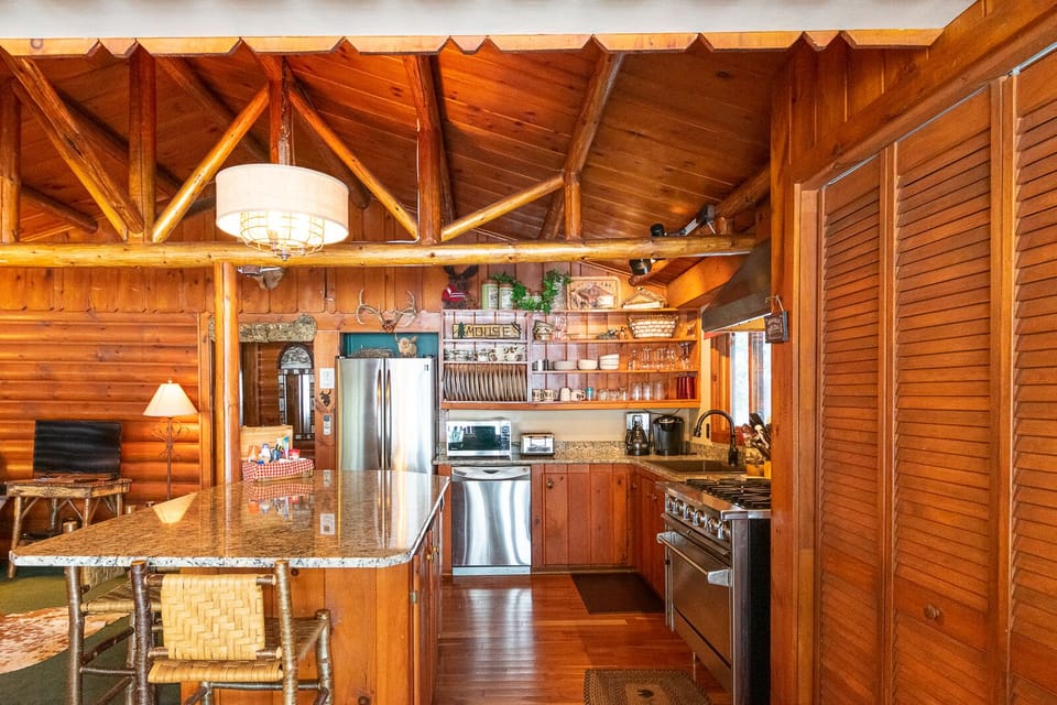 Moose kitchen includes drip and Keurig coffee pot, dishwasher & 6 burner stove.