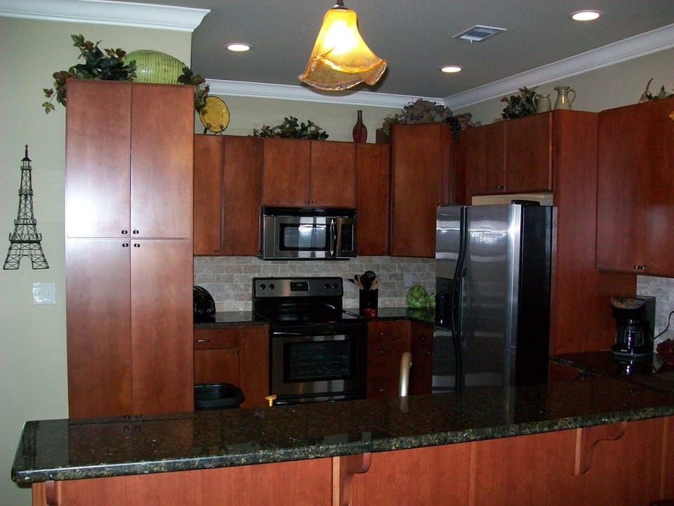 Fully stocked kitchen, granite counter tops, new stainless steel appliances.
