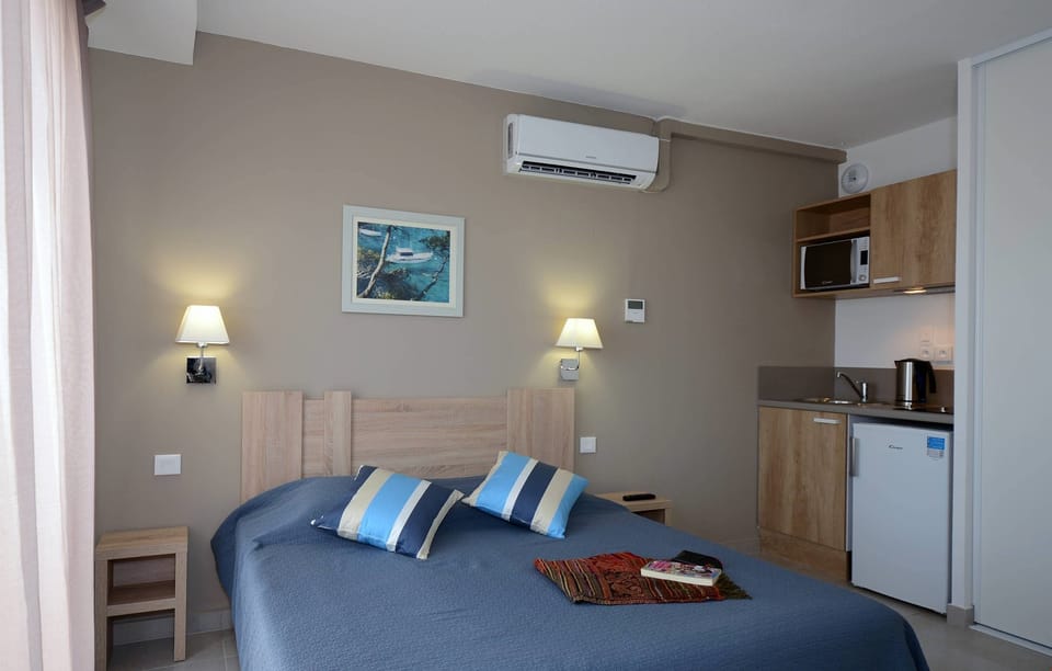 Drift to sleep in this plush bed.