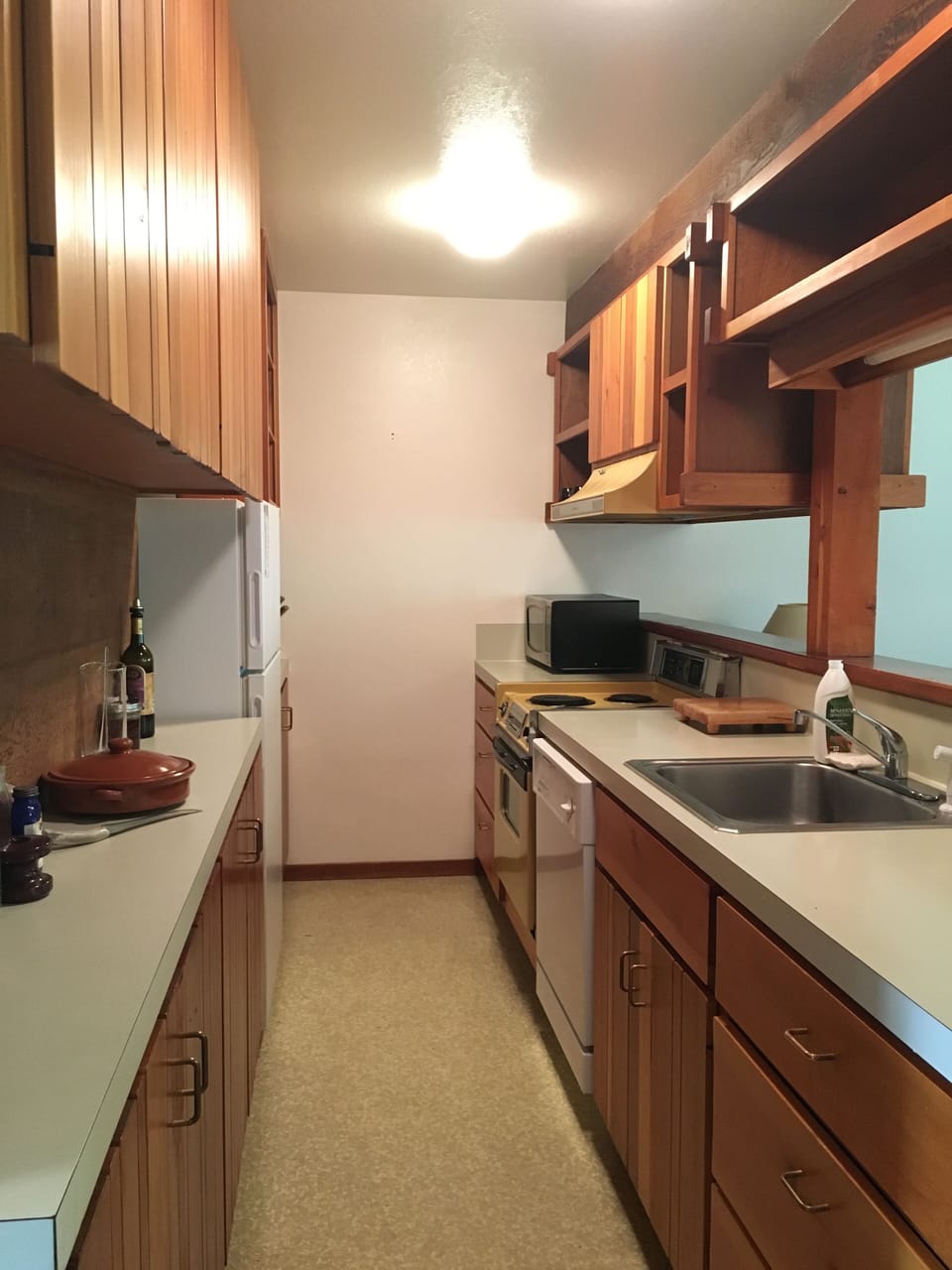 The galley kitchen offers a great spot to cook if you decide to eat in.