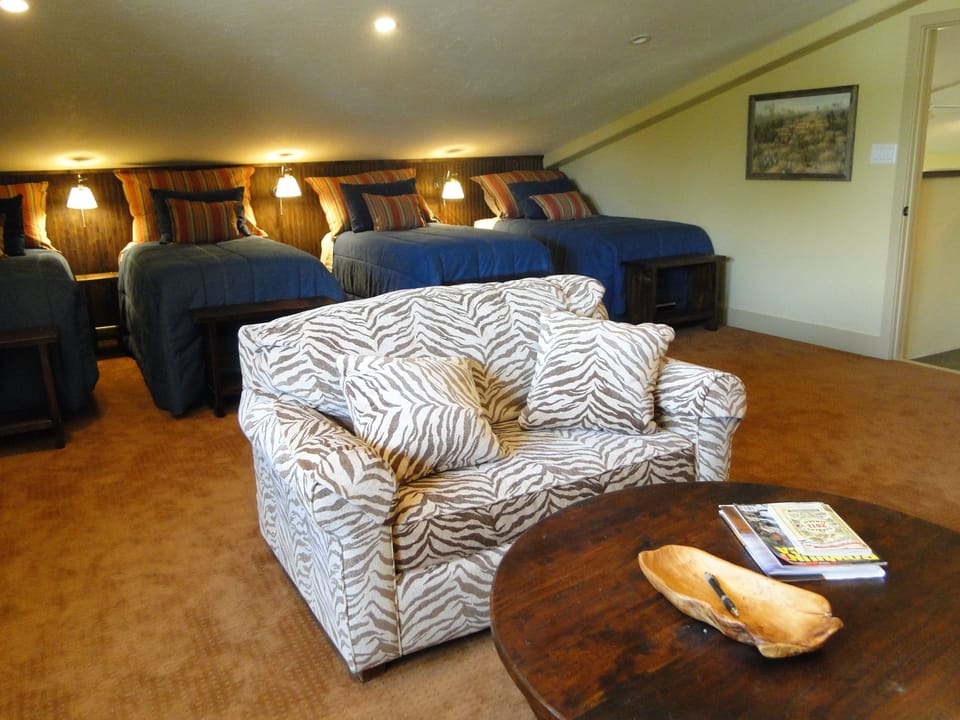 The upstairs bedroom converts to 1 King and 2 twins with 2 sleeper sofas 