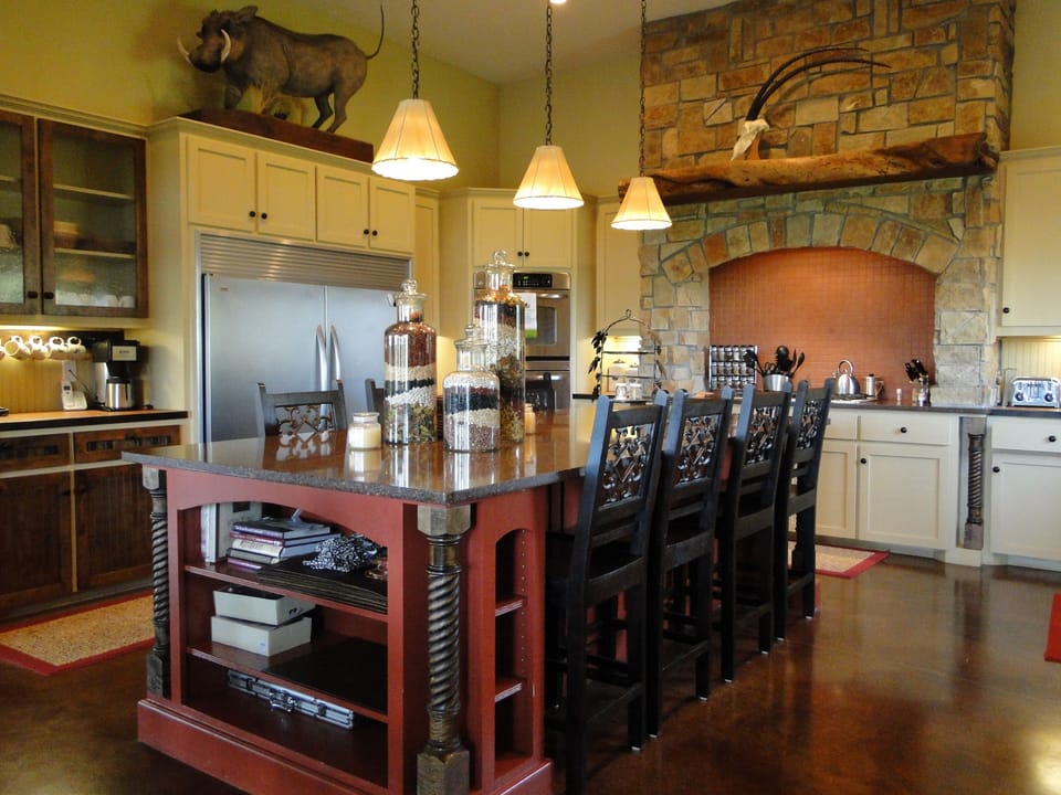 This fabulous fully equipped kitchen and dining area seats 22
