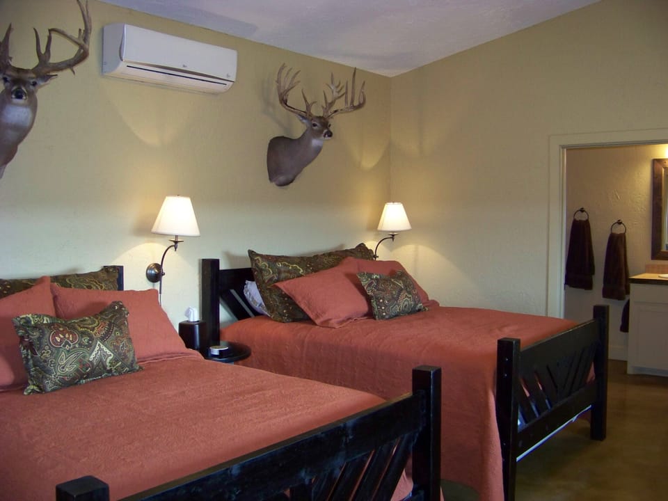 Our cabin has 2 bedrooms. Each has 2 queens 