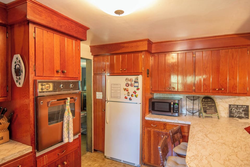 Stove, microwave and bar seating...