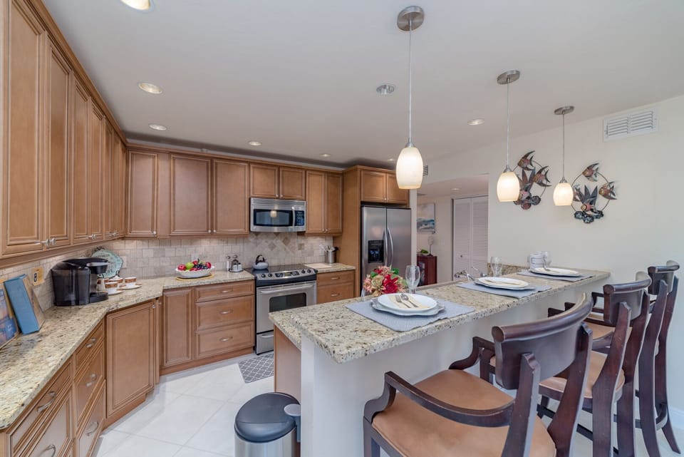 The well-stocked kitchen has plenty of room for two cooks.  No amenity has been left out.  If you find something you need, like a good neighbor you can borrow ours.  Go to our Facebook page to find a list of items included in the kitchen.