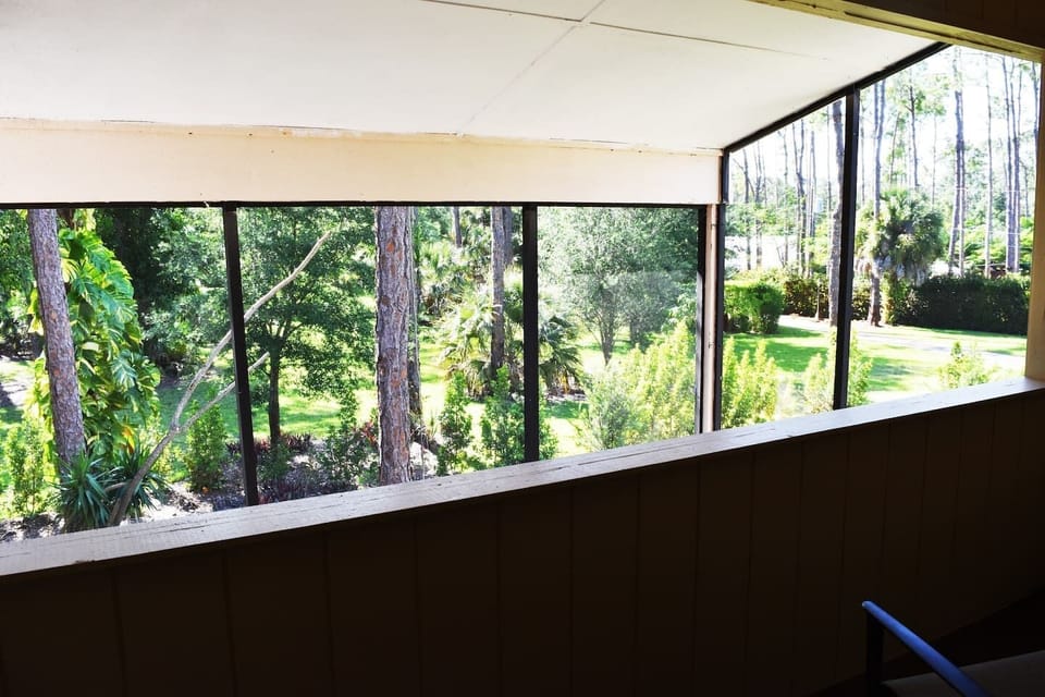 The private balcony, just off the master bedroom, provides amazing views of the lush tropical Florida landscape.  