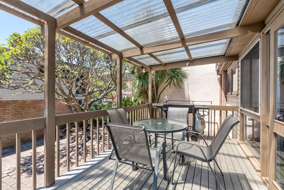 Back deck with BBQ.